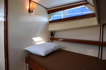 EAGLES NEST  22 Portside of V-berth with window above
