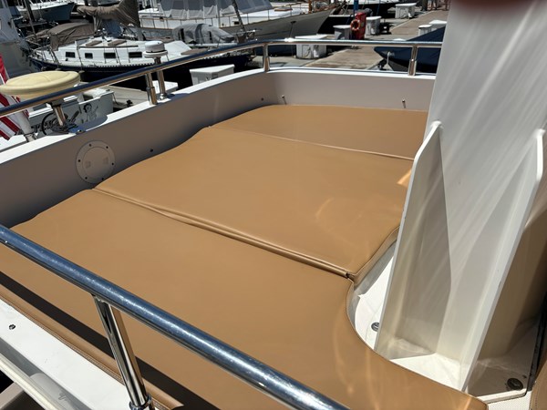FLybridge Aft:  New Sun Pad 