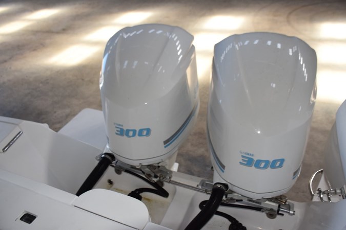 Twin Yamaha 300hp 4-strokes, low hour dependable power with power assist steering.