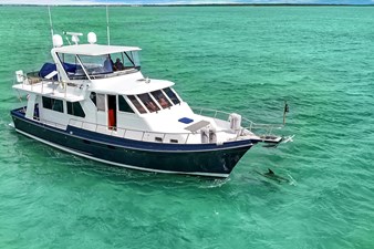 INDIGO 55 Side Profile 2; Porpoise off Bow