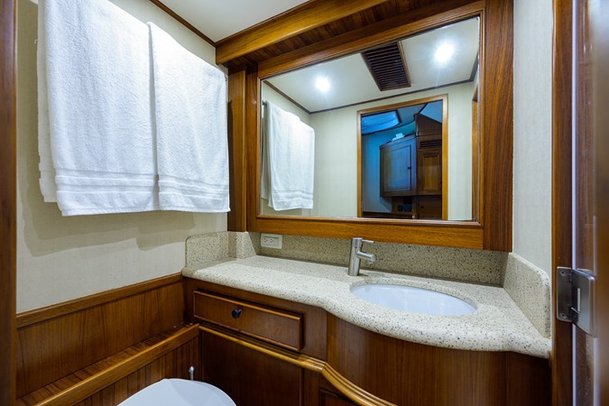 Head with large mirror, Corian vanity  
