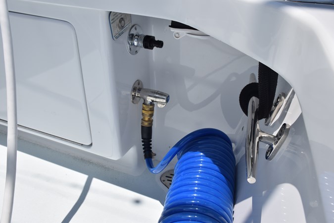 Washdown with hose and connection for outboard fresh water flushing
