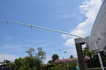 Carbon fiber outrigger poles are painted white