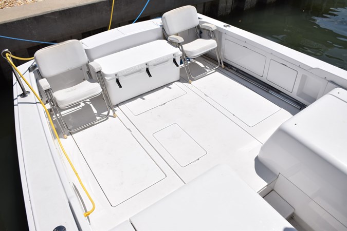 Fiberglass cockpit with guttered hatches