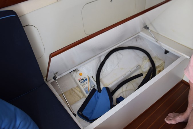 Storage beneath Settee