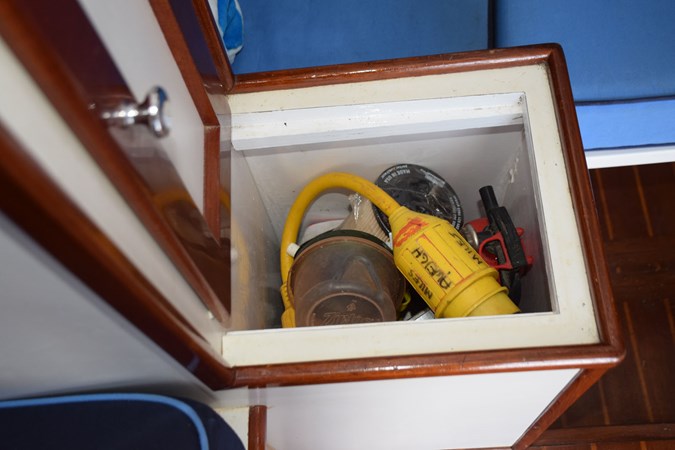 Storage cabinet separates berth area