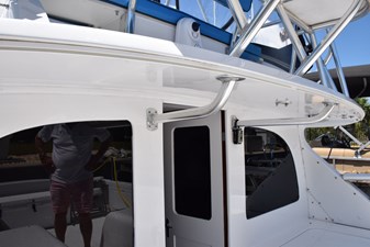 Extended overhang, rear windows are glass