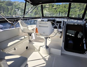 SEQUEL 22 024_Fly Bridge Port Lounge and Helm Area