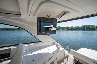 ENDLESS SUMMER 18 Cockpit TV above the wet bar
