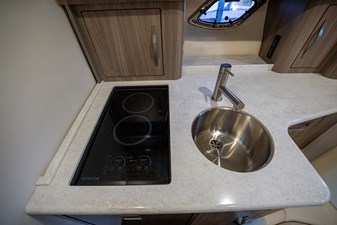ENDLESS SUMMER 59 Kenyon 2-burner cooktop and galley sink