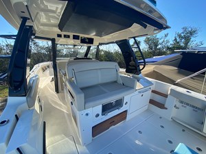UNPLUGGED 6 2023 Boston Whaler 350 Realm interior with sleek seating and modern design.