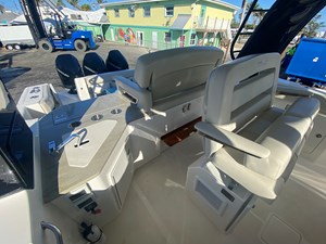 UNPLUGGED 2 2023 Boston Whaler 350 Realm interior with luxurious seating and modern amenities.