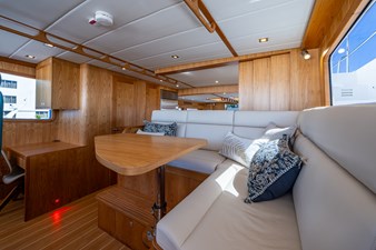 MER-SEA 11 Pilothouse Settee With Wall Behind Partially Closed