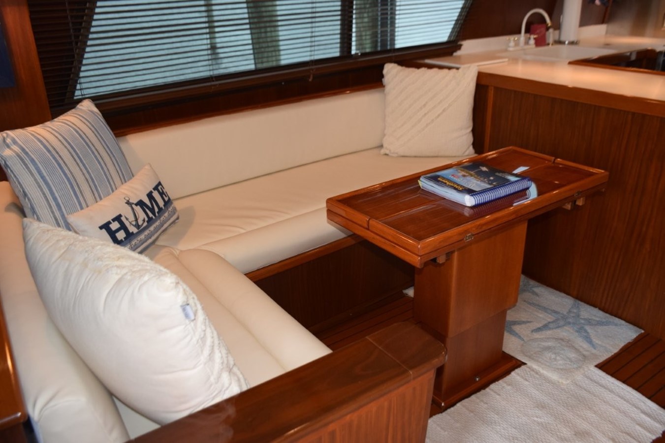 Settee with recently recovered cushions and expandable Hi-Lo table
