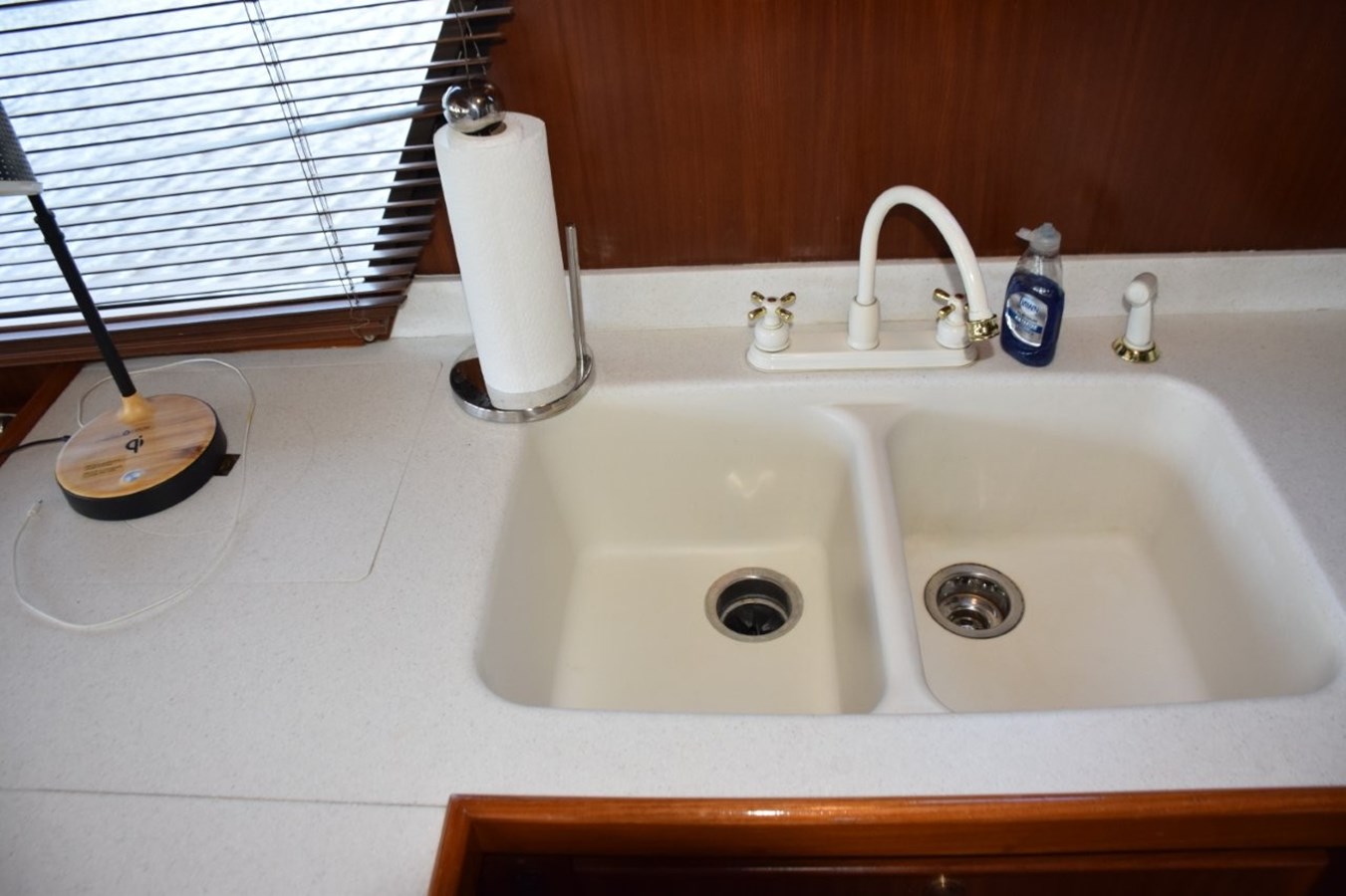 Two basin sink with disposal