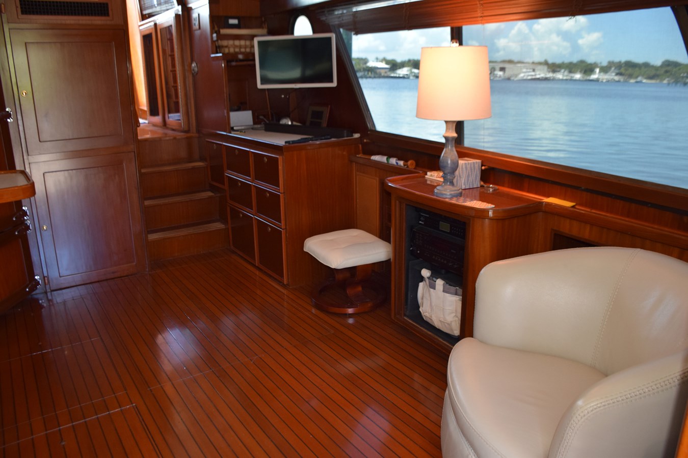 Salon view forward to steps up to pilothouse