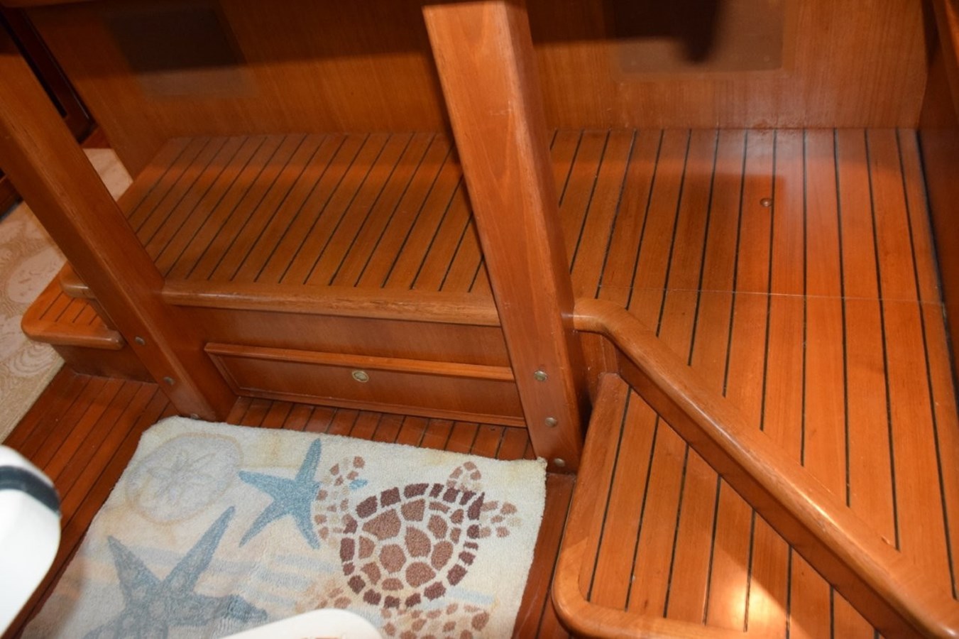 Chart drawer beneath pilothouse raised settee
