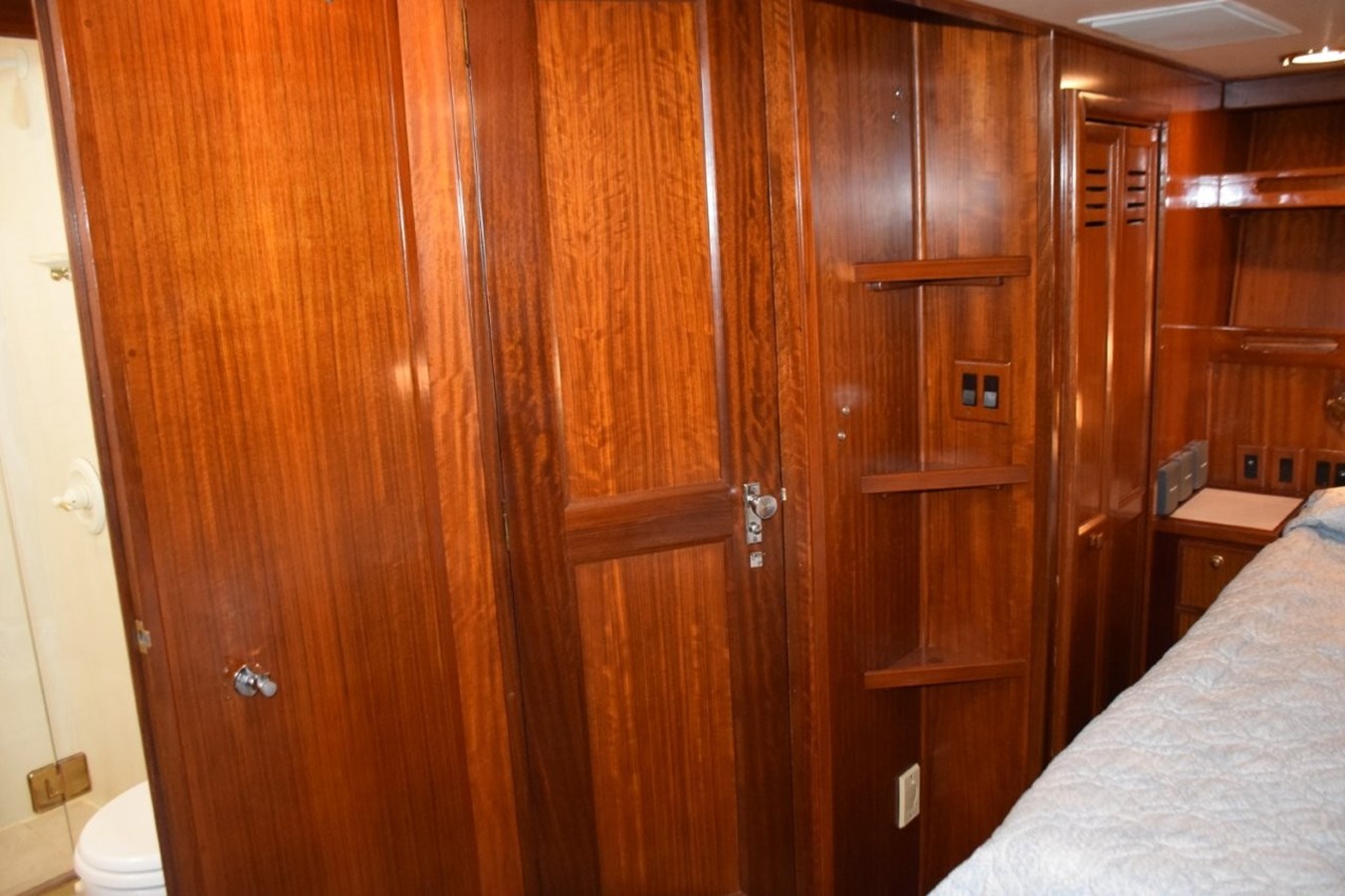 With MSR cabin door closed, shelves for display, storage closet to starboard (beneath stairway), entrance to head to port side