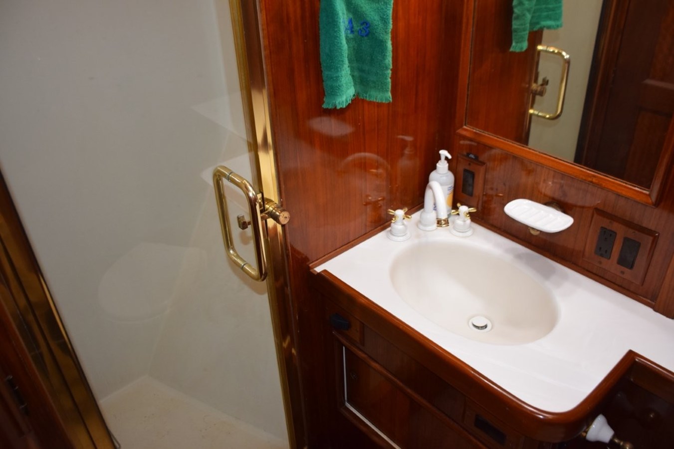 Guest stateroom glass shower door and stall