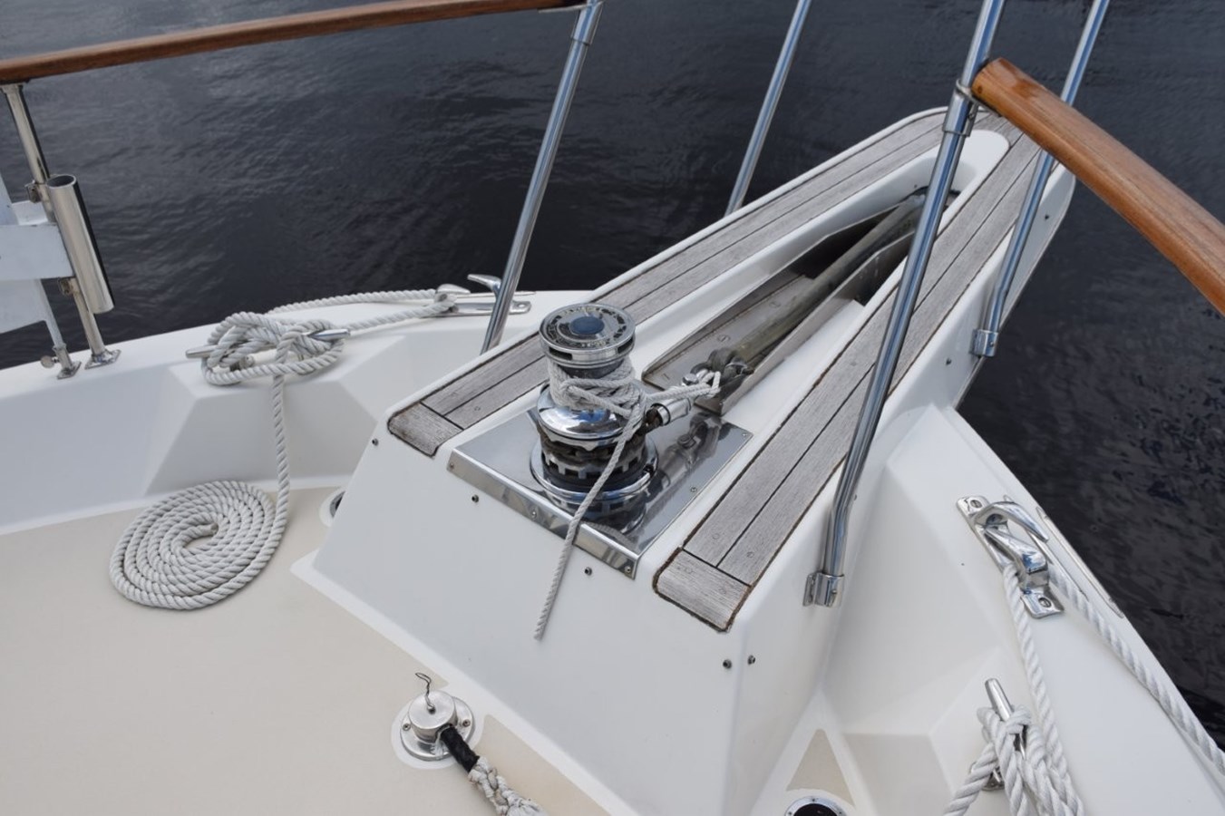 Hatteras pulpit and rebuilt Galley Maid hydraulic windlass.  Mounted plow anchor