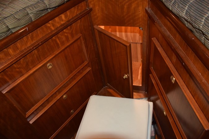 Drawer and cabinet storage below the berth