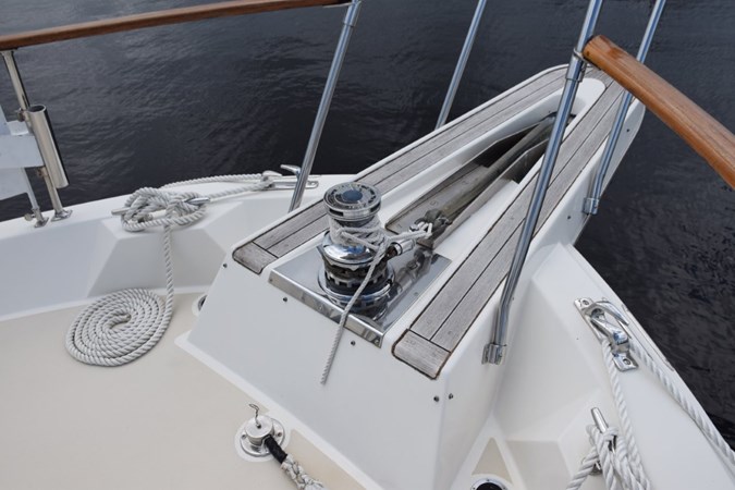 Hatteras pulpit and rebuilt Galley Maid hydraulic windlass.  Mounted plow anchor