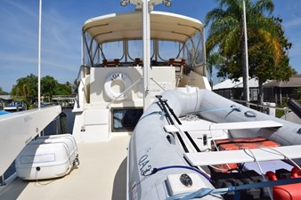 Aft flybridge with steps up to helm deck