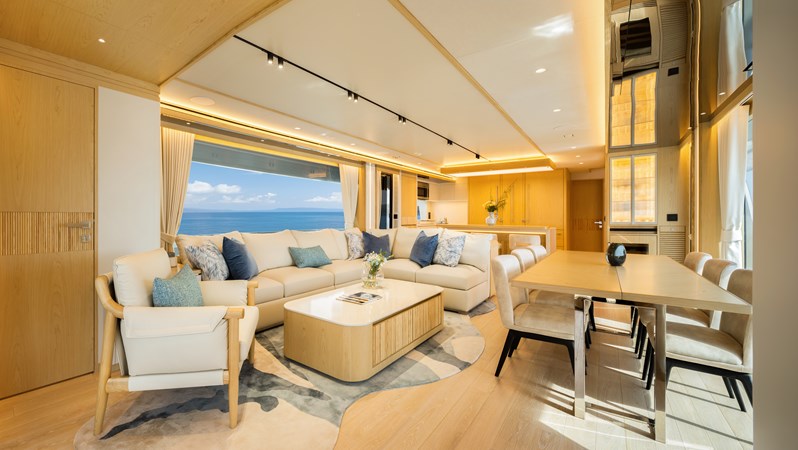 Horizon FD80 Hull 19 salon with table extended.