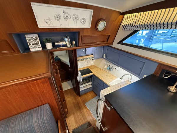 Lanai interior helm and companionway with classic Hatteras woodwork