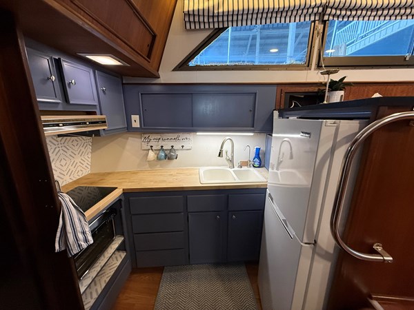 Lanai galley work area with countertop and storage