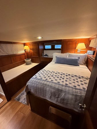 Lanai aft owner stateroom with classic Hatteras joinery