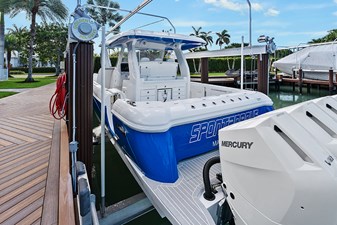 SPONTANEOUS 62 Port quarter profile while boat is on lift