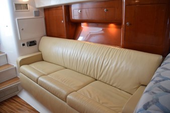 Cabin settee port side, cherry cabinetry