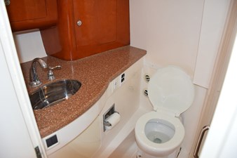 Matching vanity top with polished stainless sink, head is air-conditioned