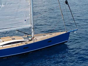 Blue hull and teak foredeck