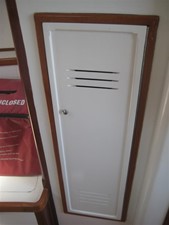 ADAGIO 9 Wasque 32 Downeast Hardtop: Hanging Locker in Main Salon